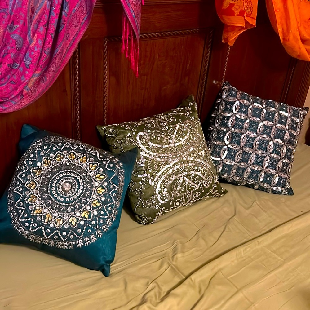 Three sequenced boho pillows